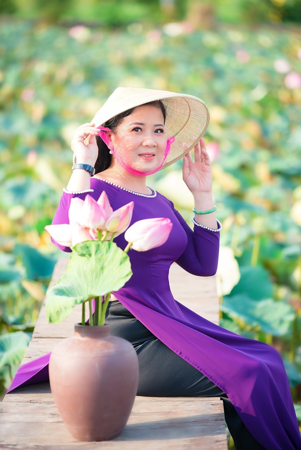 Ao dai tim hoa sen 5